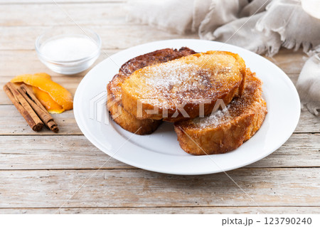 Traditional Spanish torrijas for Holy Week on wooden table. French Toast. 123790240