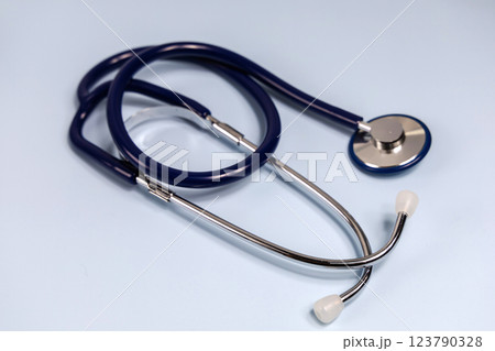 Medical stethoscope on blue background. World heart day. Medical stethoscope on blue background. World heart day. 123790328