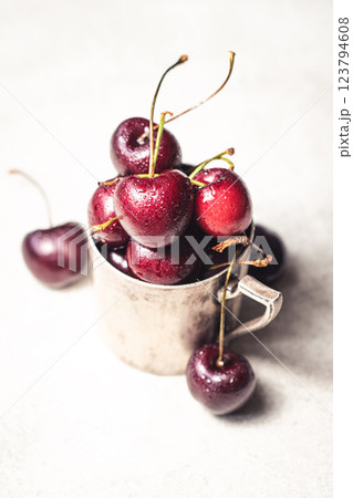 Cherry-filled metal cup Cherry-filled metal cup 123794608