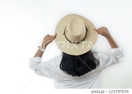 young asian indonesian woman with summer beach hat on freedom lifestyle back view isolated white background, 123797074