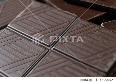 Delicious dark chocolate segments, rich black chocolate texture 123799052