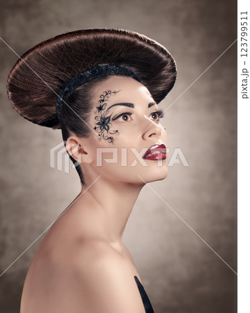 Beautiful woman with disc hairstyle 123799511