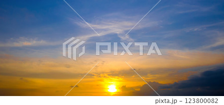 Cloudy sky and bright sunrise over the horizon. 123800082