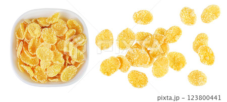 Cornflakes in ceramic bowl isolated on white background. Cornflakes in ceramic bowl isolated on white background. 123800441