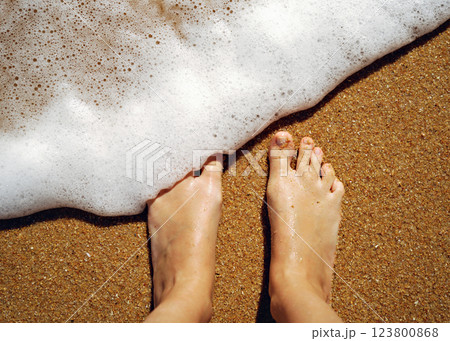 feet on sand on the beach in Portugal 123800868