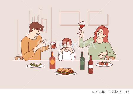 Problem of family alcoholism causes stress for little boy watching parents drink and exes about son 123801158