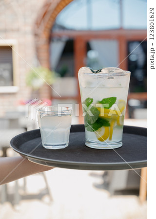 Cold refreshing lemonade or mojito with ice and mint leaves. 123801629