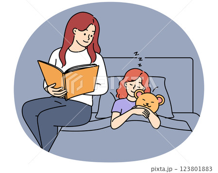 Loving mother read book to daughter in bed 123801883