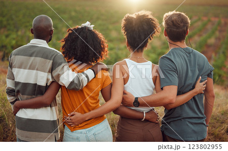 Diversity, view and friends together hug, friendship and love on a countryside farm in France. People relax, back and summer people on holiday vacation in nature, vineyard or outdoor during sunset 123802955
