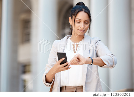 Business woman, phone and time in city travel, work commute or London lunch break. Thinking worker, employee or creative designer with 5g mobile, networking technology or clock in schedule management 123803201