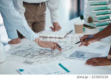 Architect, hands and planning building on paper for construction design or layout at the office. Group hand of employee in teamwork project plan for architecture working on model build or blueprint 123803226