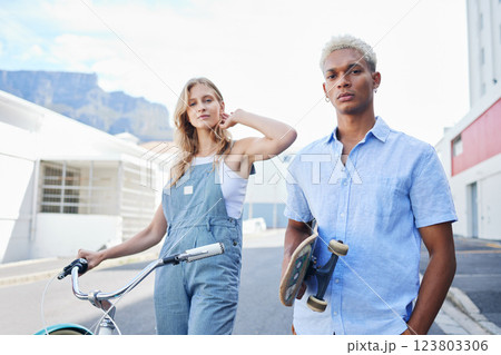 Couple, skateboard and bicycle in portrait for fashion, fun and ride in city during summer. Man, woman and bike outdoor together to skate, cycle and gen z on street with confidence in Cape Town Couple, skateboard and bicycle in portrait for fashion, fun and ride in city during summer. Man, woman and bike outdoor together to skate, cycle and gen z on street with confidence in Cape Town 123803306