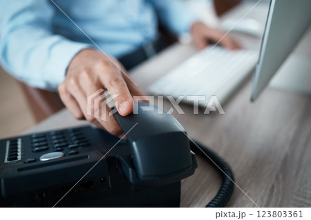 Hand of receptionist on telephone, person contact us in business office and communication at help desk. Answer customer call in company, assistant in corporate crm and call center secretary working 123803361