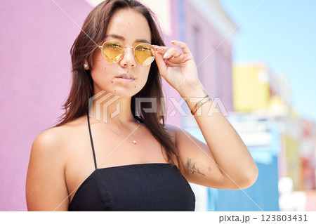 Face, fashion sunglasses and portrait of woman, cool and trendy style outdoors. Beauty, gen z and elegant female model from Canada in retro, funky or vintage eyewear with serious facial expression. 123803431