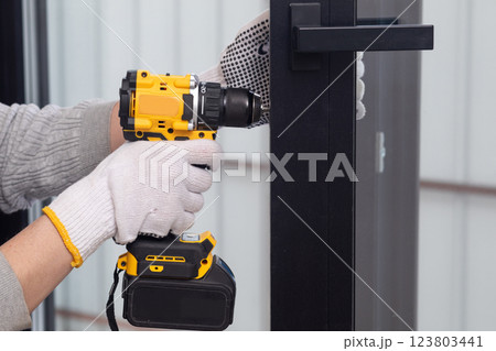 Door hardware installation. Door hardware installation. 123803441