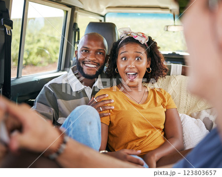 Road trip, couple in van travel and experience countryside adventure holiday together. Summer safari adventure, happy black couple relax in a caravan and listen to nature tour guide with a wow smile Road trip, couple in van travel and experience countryside adventure holiday together. Summer safari adventure, happy black couple relax in a caravan and listen to nature tour guide with a wow smile 123803657