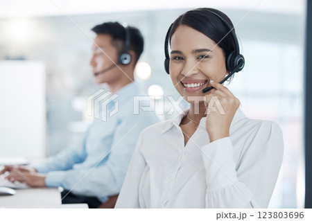 Woman, call center and smile consultant in office, workspace and with headset for customer conversation. Telemarketing, female worker and working girl talking, discussion or help client in workplace. Woman, call center and smile consultant in office, workspace and with headset for customer conversation. Telemarketing, female worker and working girl talking, discussion or help client in workplace. 123803696
