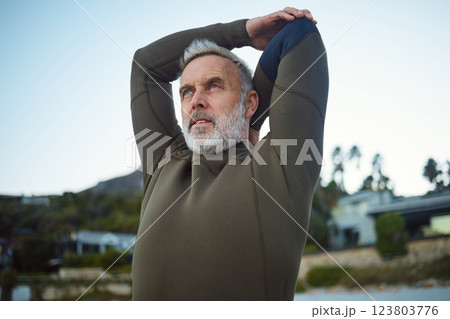 Beach surfing, man and stretching arms for fitness, wellness and healthy summer sports on retirement holiday in Australia. Senior surfer focus, freedom and sea travel for swimming, exercise and ocean 123803776