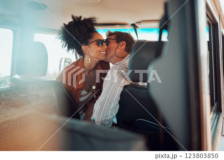 Love, couple and cheek kiss on road trip, vacation or summer holiday trip. Sunglasses, diversity and man kissing woman, affection or bonding, care or romance on car drive and spending time together. Love, couple and cheek kiss on road trip, vacation or summer holiday trip. Sunglasses, diversity and man kissing woman, affection or bonding, care or romance on car drive and spending time together. 123803850