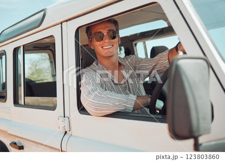 Travel, driving and adventure man in a caravan for outdoor nature journey, holiday in summer or vacation with sunglasses portrait. Young man in a van or car transport for a drive in countryside life 123803860