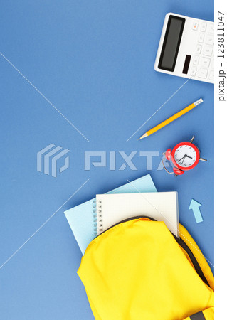 School backpack with stationery on the desk. School backpack with stationery on the desk. 123811047