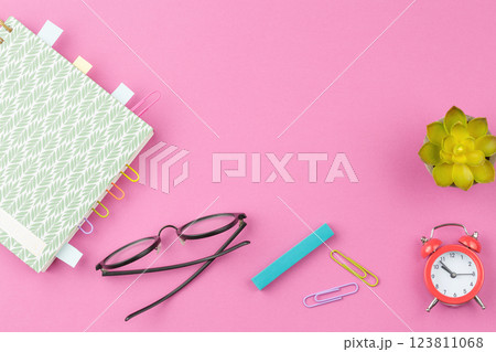 Spiral notepad on pink background. Spiral notepad on pink background. 123811068