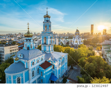 Summer Yekaterinburg, Temple of the Ascension and Temple on Blood in beautiful clear sunset. Summer Yekaterinburg, Temple of the Ascension and Temple on Blood in beautiful clear sunset. 123812497