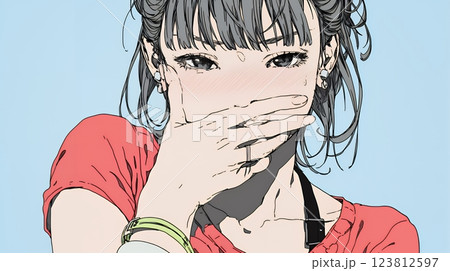 失言をして恥ずかしくて思わず口を手で覆っている若い女性