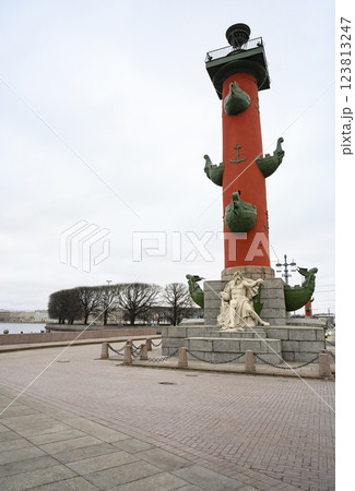 Evening view of the Arrow of Vasilyevsky Island with Rostral Columns in Saint Petersburg, Russia Evening view of the Arrow of Vasilyevsky Island with Rostral Columns in Saint Petersburg, Russia 123813247
