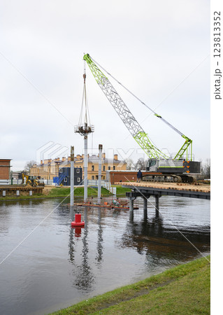 Construction of a bridge across the Kronverksky Strait in St. Petersburg, Russia, in autumn 123813352