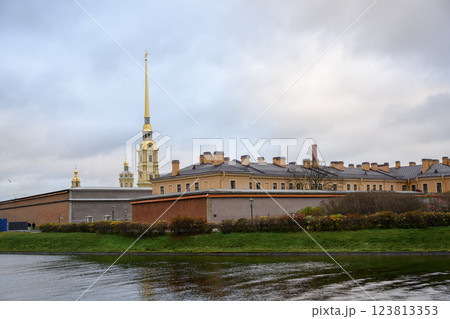 Spire and dome of Peter and Paul Cathedral and fortress wall in St. Petersburg, Russia, in autumn 123813353