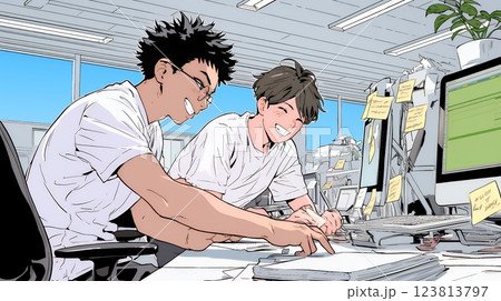 OJT：オフィスで、部下（後輩）を指導するマネージャー