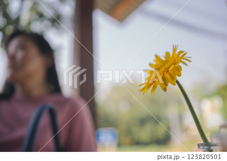 happy and cheerful with asian woman enjoy with coffee and cake in coffee shop 123820501