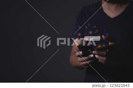 Young man hand holding smartphone to review and gives 1 star Young man hand holding smartphone to review and gives 1 star 123821645