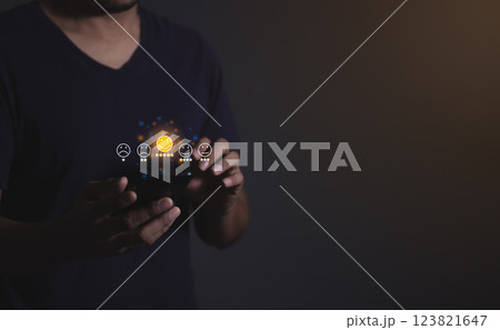 Young Man hand touching emoji and five star to review and give 5 stars  123821647