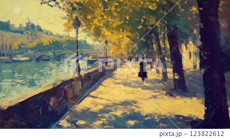 Serene riverside walk in autumn with trees and sunlight reflecting on the water in a charming city 123822612