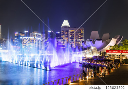 Beautiful view of the nightly music, water, and light show at Marina Bay Sands, here is an integrated resort fronting Marina Bay in Singapore. Beautiful view of the nightly music, water, and light show at Marina Bay Sands, here is an integrated resort fronting Marina Bay in Singapore. 123823802