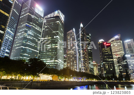 Night view of the Marina Bay Financial Centre and the Raffles Place modern office skyscrapers along Marina Bay in Singapore. Night view of the Marina Bay Financial Centre and the Raffles Place modern office skyscrapers along Marina Bay in Singapore. 123823803