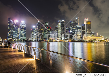 Night view of modern skyscrapers along Marina Bay in the Raffles Place financial district from the Marina Bay Sands observation deck, Singapore. 123823815
