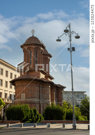 Historic church in Bucharest, Romania showcasing beautiful architecture under a clear blue sky Historic church in Bucharest, Romania showcasing beautiful architecture under a clear blue sky 123824475