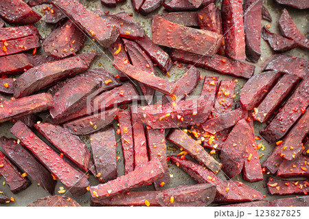 Cooking baked beets with olive oil, salt, dried vegetables, pepper 123827825
