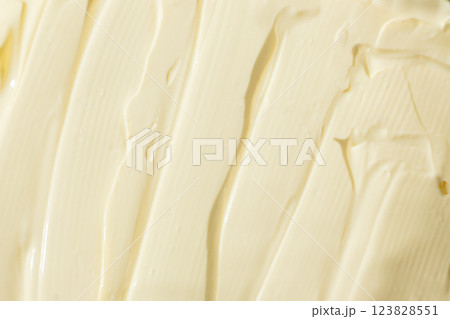 Abstract cooking background of smeared mayonnaise sauce, top view, creativity in cooking Abstract cooking background of smeared mayonnaise sauce, top view, creativity in cooking 123828551