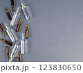 Ampoules with medicine on gray background 123830650