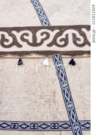 Fragment of Kyrgyz national ornament on a felt yurt 123831929