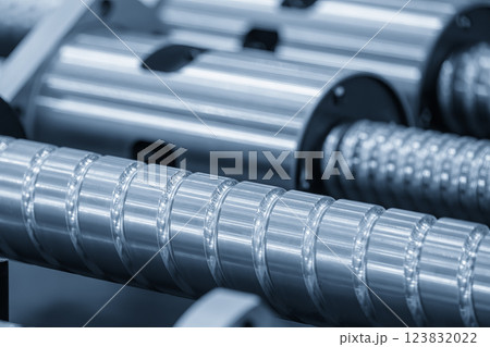 Closeup scene the spare parts lead ball screw set in the light blue scene. Closeup scene the spare parts lead ball screw set in the light blue scene. 123832022