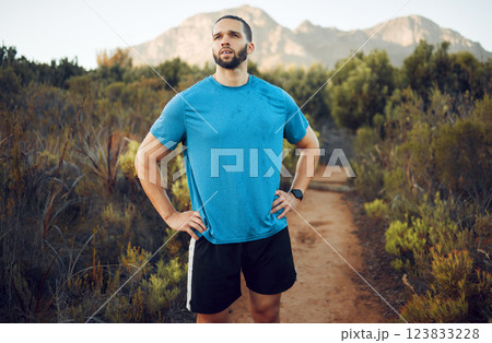 Nature hiking, run and fitness workout of a man on a calm morning on a mountain park running trail. Health exercise, training and healthy person outdoor on walking or runner break with mountains view Nature hiking, run and fitness workout of a man on a calm morning on a mountain park running trail. Health exercise, training and healthy person outdoor on walking or runner break with mountains view 123833228