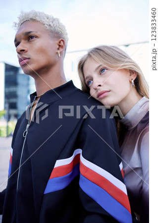 Couple love, serious and street fashion modern gen z or edgy millennial style in city together. Young man and woman, diverse fashionable friends and cool trendy youth outdoor designer wear lifestyle 123833460