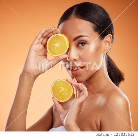 Skincare in nature, beauty and black woman with lemon vitamin c facial detox for beautiful, natural and healthy skin glow. Fruit, wellness and sustainability, luxury eco cleaning and makeup product. Skincare in nature, beauty and black woman with lemon vitamin c facial detox for beautiful, natural and healthy skin glow. Fruit, wellness and sustainability, luxury eco cleaning and makeup product. 123833612