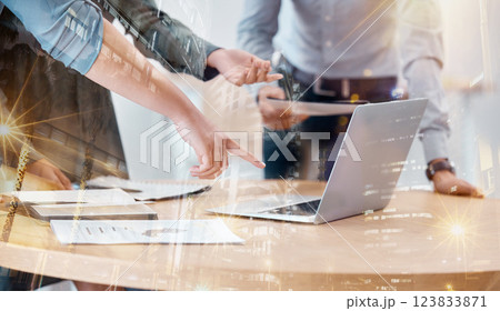 Business people, hands and laptop double exposure, planning and strategy in modern office. Closeup employees, teamwork and computer data research, future innovation and digital marketing with overlay Business people, hands and laptop double exposure, planning and strategy in modern office. Closeup employees, teamwork and computer data research, future innovation and digital marketing with overlay 123833871
