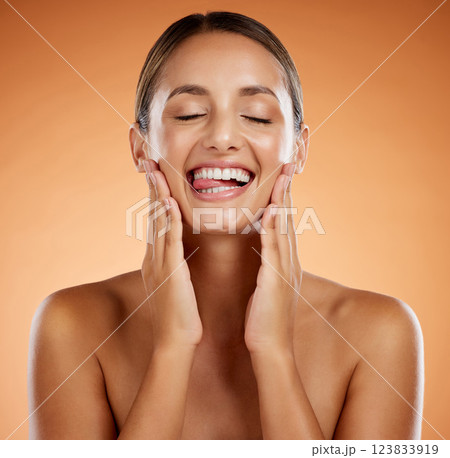 Face, skin and hands, natural beauty and skincare, happy woman in cosmetics advertising. Clean and fresh, glow and facial treatment, body wellness in closed eyes closeup and orange studio background. Face, skin and hands, natural beauty and skincare, happy woman in cosmetics advertising. Clean and fresh, glow and facial treatment, body wellness in closed eyes closeup and orange studio background. 123833919